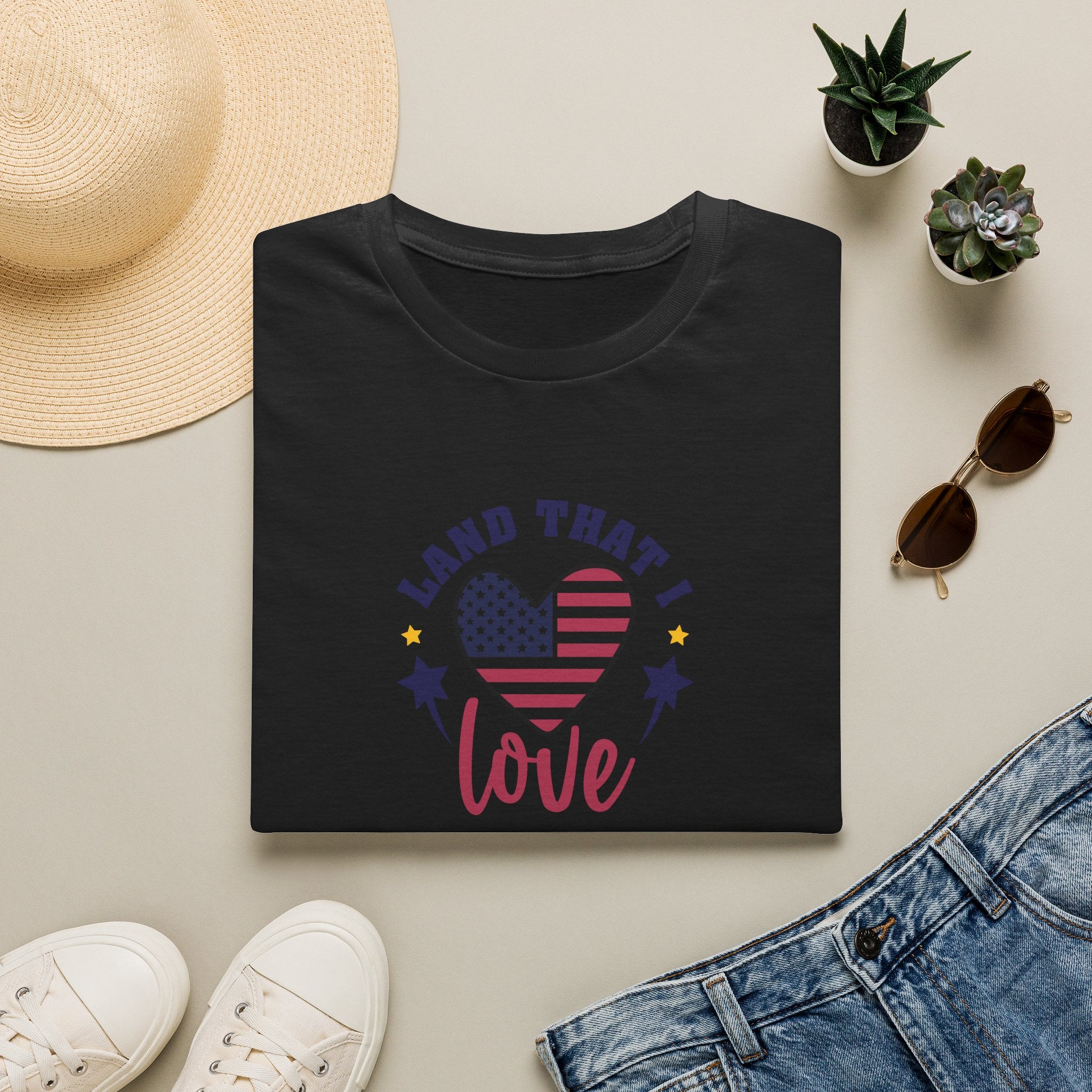 Land That I Love Patriotic T-Shirt — American flag tribute tee featuring a heart design with stars.
