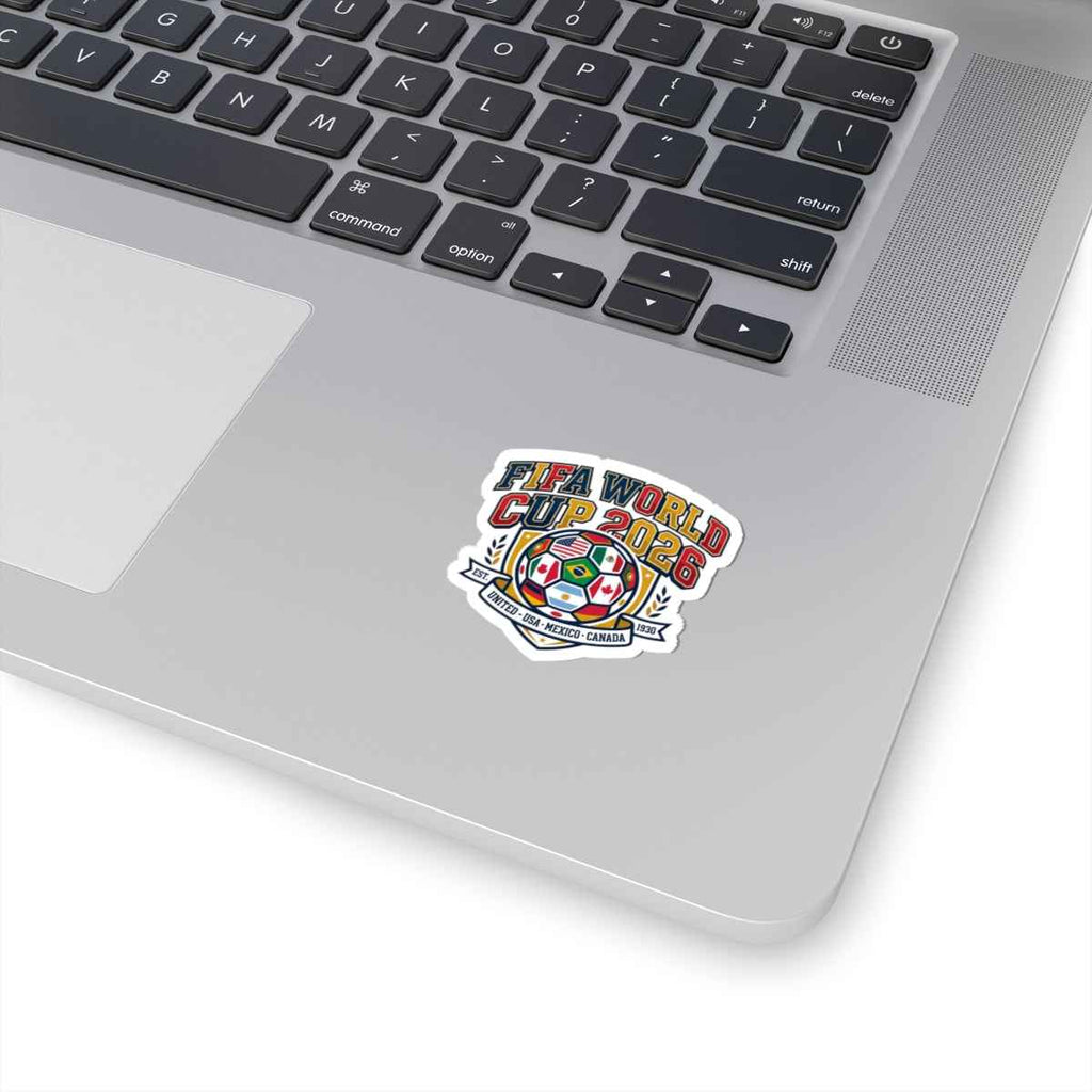 World Cup 2026 soccer sticker on a laptop, showcasing vibrant colors and a soccer motif for fans.