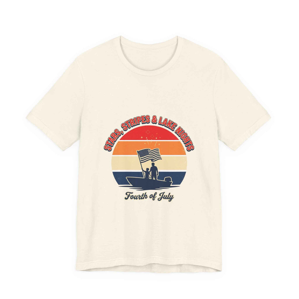 Vintage Fourth of July shirt featuring sunset graphic and waving flag design on a cream tee.