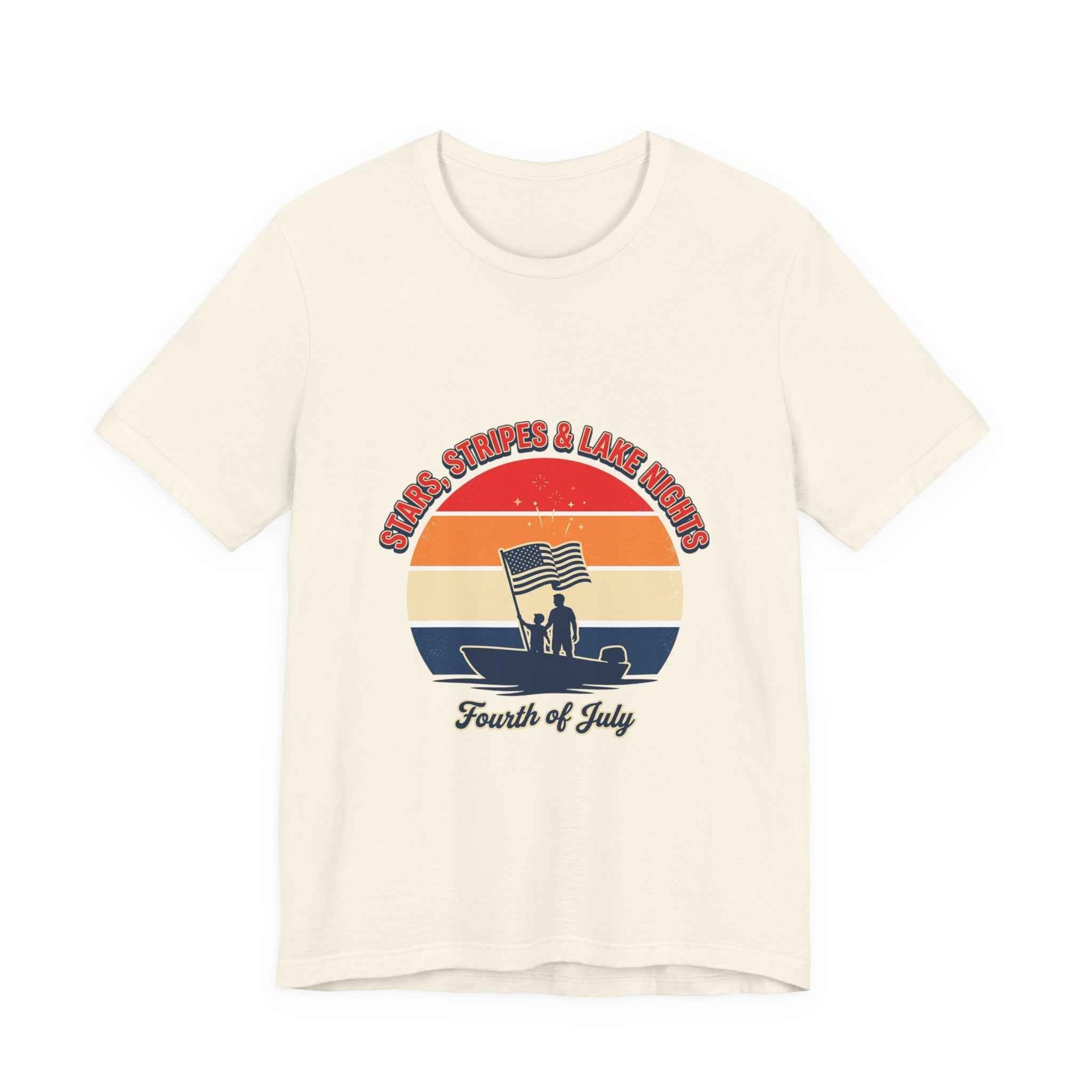 Vintage Fourth of July shirt featuring sunset graphic and waving flag design on a cream tee.