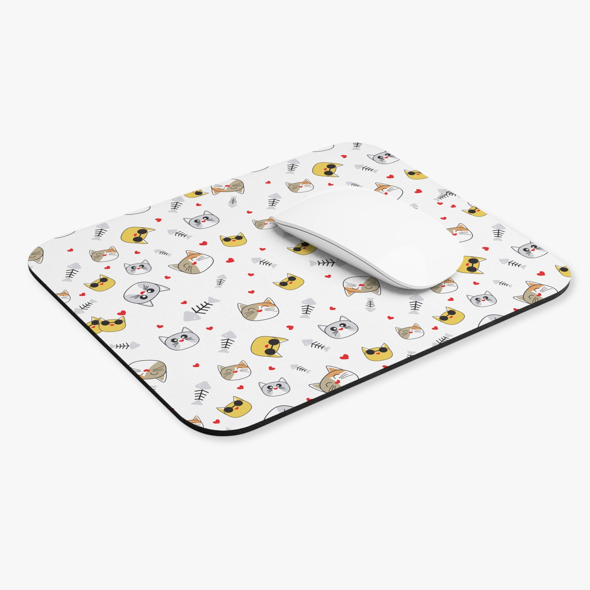Cat-themed mouse pad with cute cat faces, perfect for cat lovers to brighten their workspace.