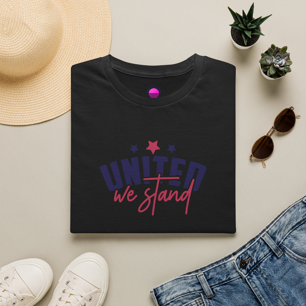 United We Stand July 4th patriotic t-shirt on a flat lay with accessories and a stylish background.