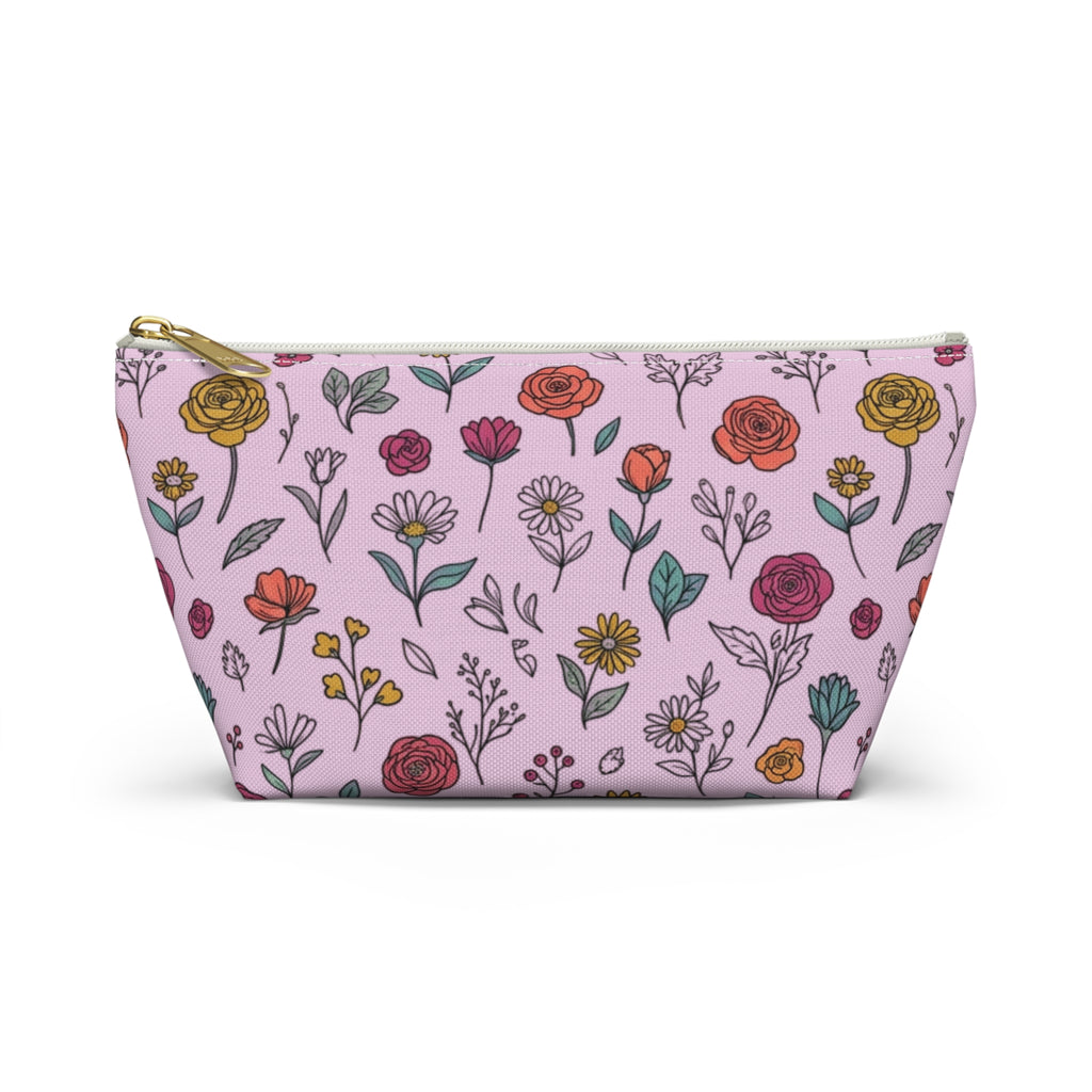 Floral Doodle Accessory Pouch in light pink with hand-drawn flowers, ideal for makeup & travel essentials. Floral doodle makeup pouch.