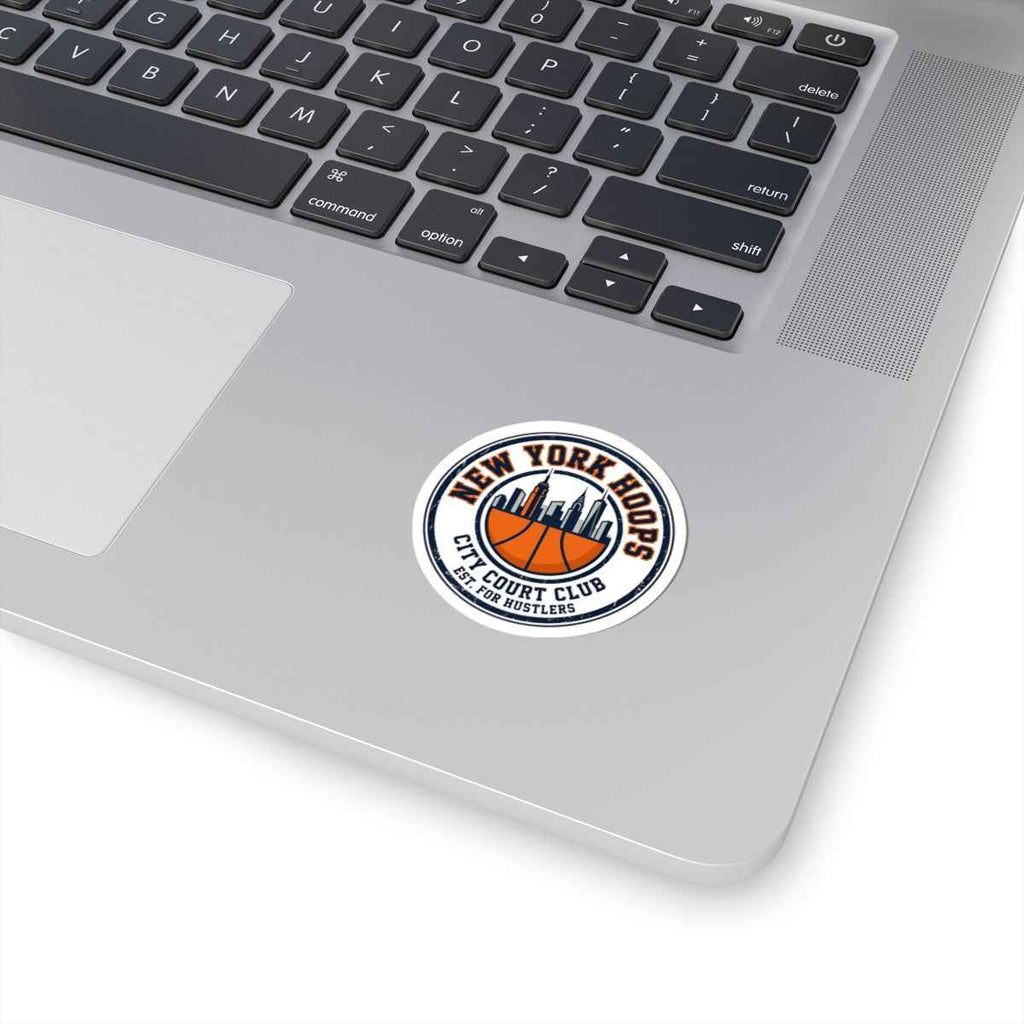 New York basketball sticker on a laptop featuring retro block letters and a basketball crest design.