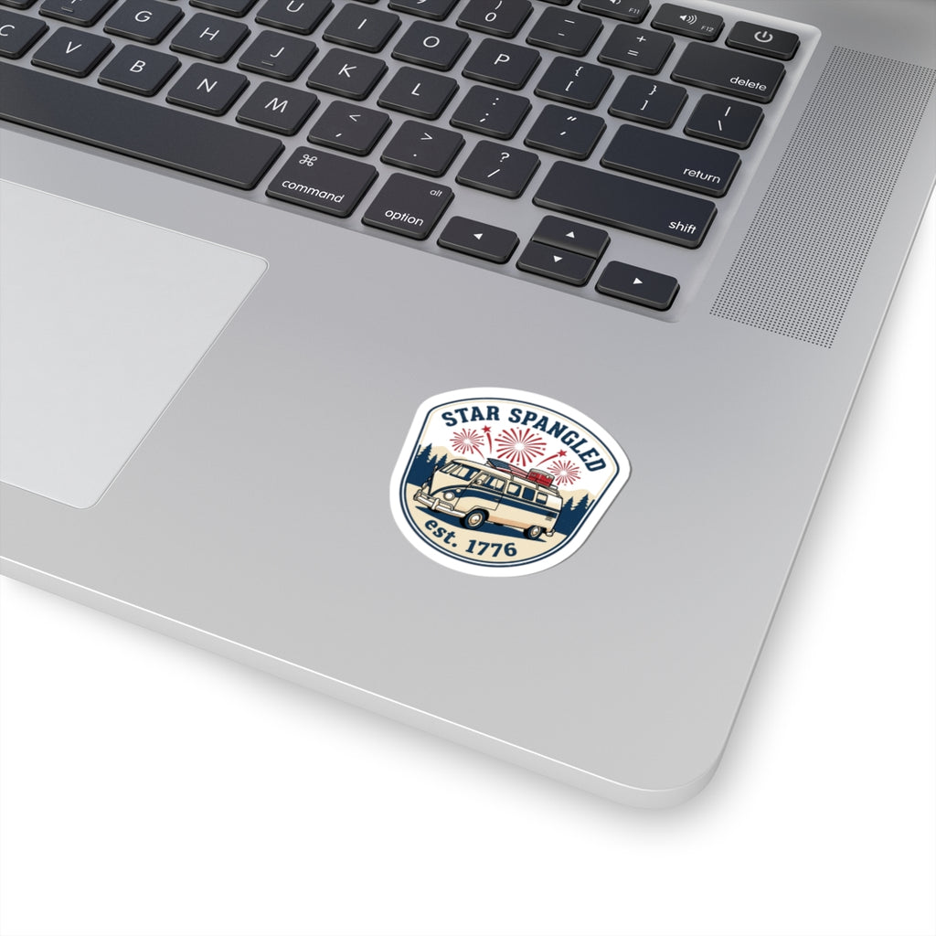 custom kiss-cut stickers on a laptop featuring a 'Star Spangled' design with fireworks and a vintage vehicle.