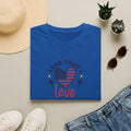 Land That I Love patriotic t-shirt with American flag, blue tee featuring heart and stars design.